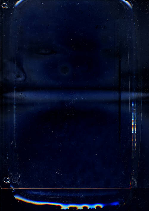 blank water scan scan image. dark picture because of opened flatbed scanner. a glass lasagne oven basin is put on top of the scanner and filled with water