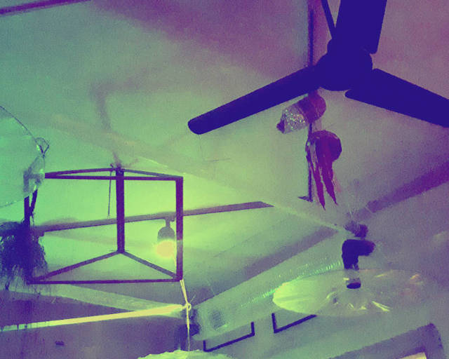 pandemic ventilation system ventilation fans and air tubes and other stuff attached to the ceiling of this room