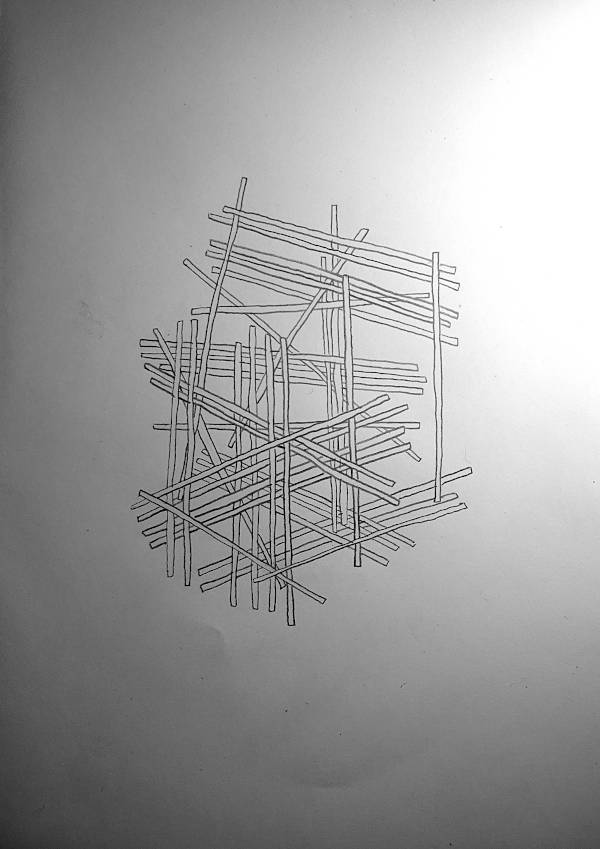 many thin pieces of wood lie on top of each other.
