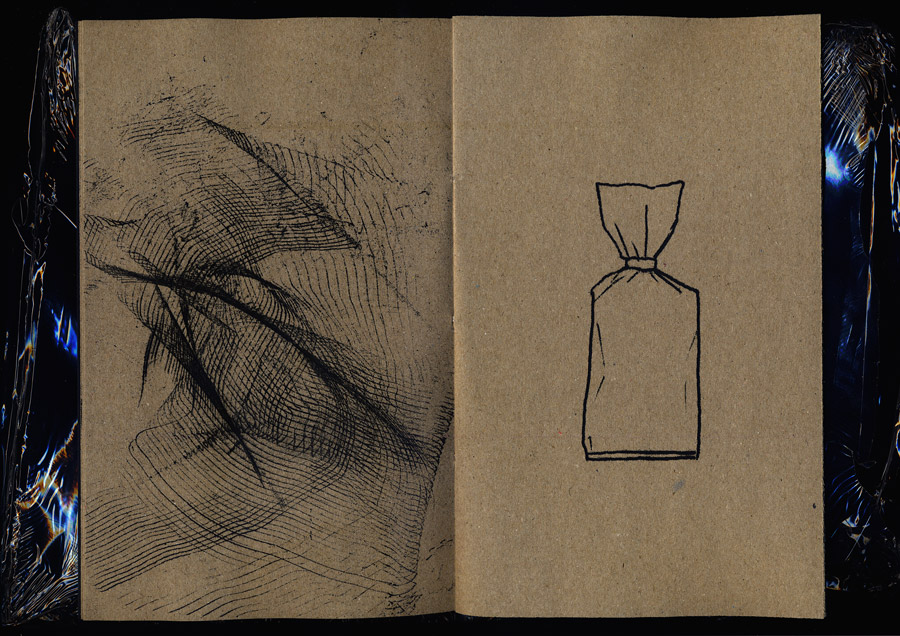 open book, left page comb traces, right page outline of some product’s packaging bag